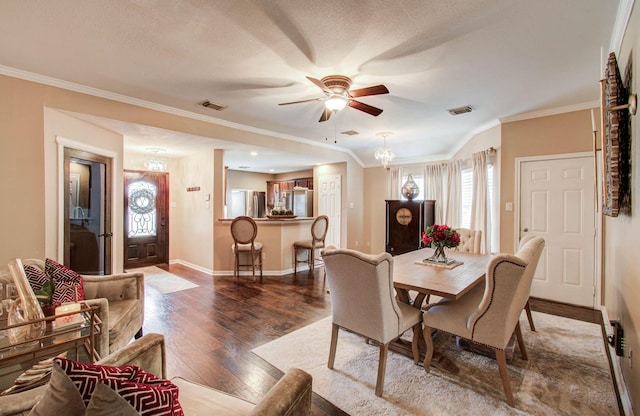 2516 Vaughn St, Houston, TX 77093 - dining area with wood finished floors, ceiling fan, ornamental molding, and a chandelier