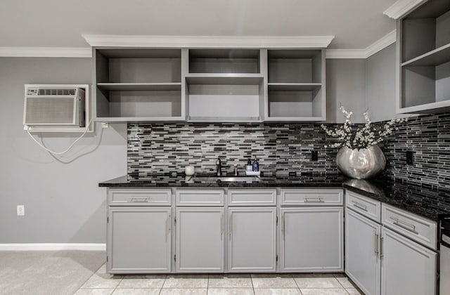 2516 Vaughn St, Houston, TX 77093 - kitchen featuring open shelves, dark stone counters, crown molding, tasteful backsplash, and light tile patterned floors