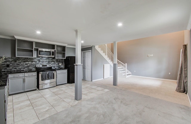 2516 Vaughn St, Houston, TX 77093 - kitchen with appliances with stainless steel finishes, open shelves, dark countertops, decorative backsplash, and recessed lighting