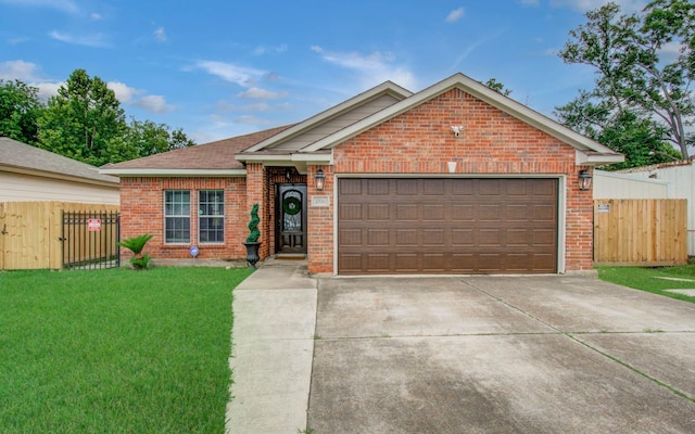 2516 Vaughn St, Houston, TX 77093 - ranch-style house featuring brick siding, concrete driveway, an attached garage, and a gate