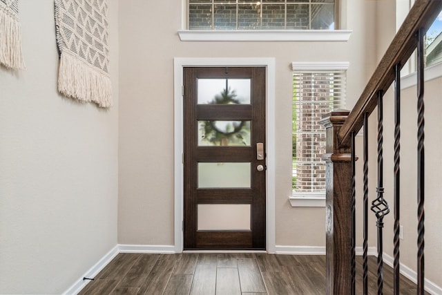 7906 Pershing Ave, Magnolia, TX 77354 - entrance foyer featuring dark wood-type flooring