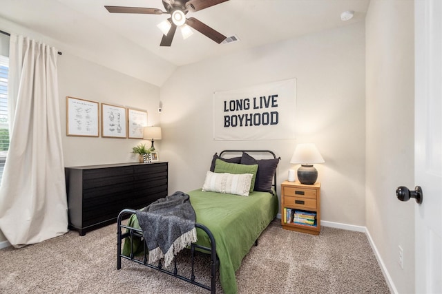 7906 Pershing Ave, Magnolia, TX 77354 - carpeted bedroom with vaulted ceiling and a ceiling fan