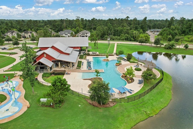7906 Pershing Ave, Magnolia, TX 77354 - aerial view of a pool and a forest