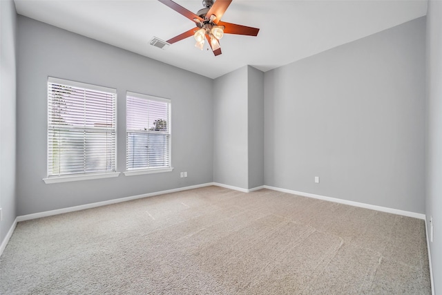 542 Bomar St, Houston, TX 77006 - carpeted spare room featuring baseboards and a ceiling fan