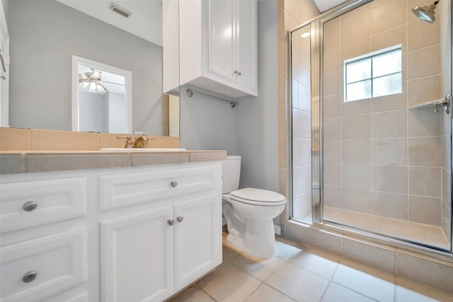 542 Bomar St, Houston, TX 77006 - full bath with a stall shower, vanity, tile patterned flooring, and ceiling fan