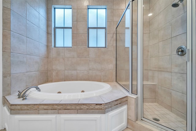 542 Bomar St, Houston, TX 77006 - bathroom with a shower stall and a jetted tub