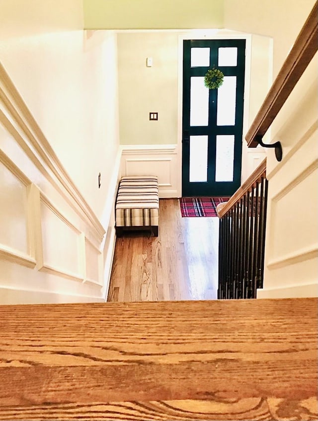 2006 Buffalo Ter, Houston, TX 77019 - entryway with wood finished floors and a wainscoted wall