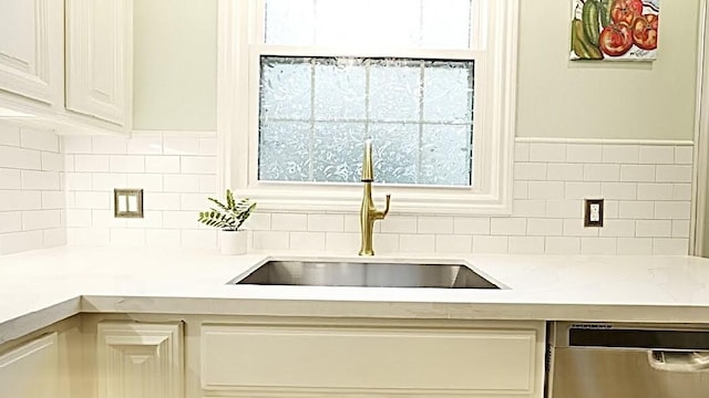 2006 Buffalo Ter, Houston, TX 77019 - kitchen featuring dishwasher, decorative backsplash, and white cabinets