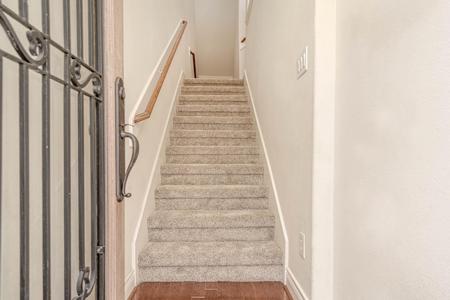 5817 Katy St, Houston, TX 77007 - stairs featuring baseboards