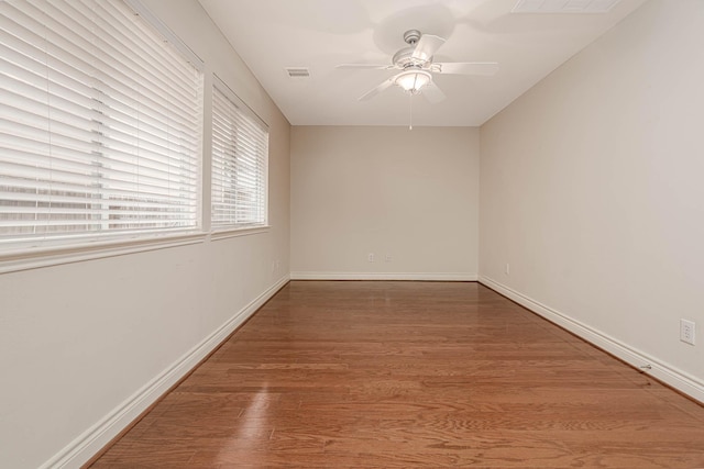 5817 Katy St, Houston, TX 77007 - empty room featuring wood finished floors and ceiling fan