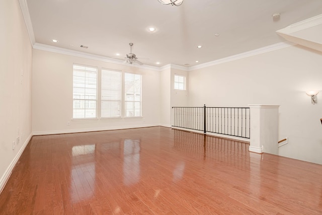 5817 Katy St, Houston, TX 77007 - unfurnished room featuring a ceiling fan, wood finished floors, recessed lighting, and crown molding