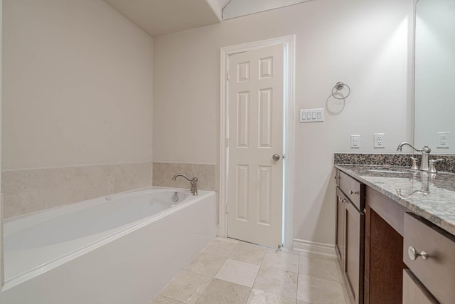5817 Katy St, Houston, TX 77007 - full bathroom with vanity, a garden tub, and tile patterned floors