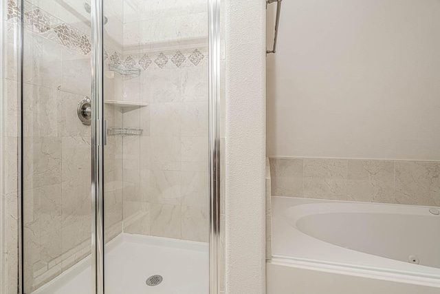 5817 Katy St, Houston, TX 77007 - bathroom with a garden tub and a stall shower