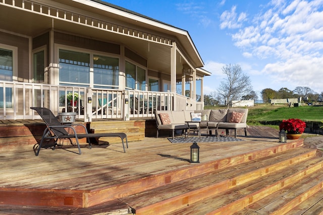 129 Lakeshore Dr, Onalaska, TX 77360 - wooden deck featuring an outdoor living space