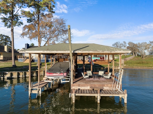 129 Lakeshore Dr, Onalaska, TX 77360 - dock with boat lift, a water view, and a yard