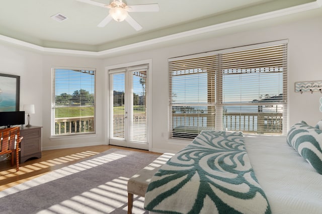 129 Lakeshore Dr, Onalaska, TX 77360 - bedroom with access to outside and ceiling fan