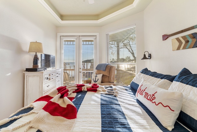 129 Lakeshore Dr, Onalaska, TX 77360 - bedroom with multiple windows and access to exterior