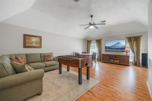 9706 Broadley Dr, Sugar Land, TX 77498 - playroom featuring light wood-type flooring, a ceiling fan, and lofted ceiling
