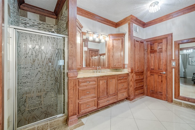 9706 Broadley Dr, Sugar Land, TX 77498 - full bath featuring a stall shower, ornamental molding, vanity, a textured ceiling, and tile patterned floors