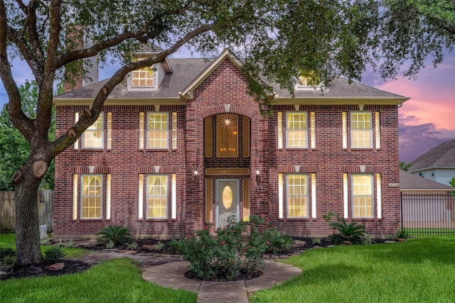 9706 Broadley Dr, Sugar Land, TX 77498 - view of front facade featuring brick siding and a shingled roof