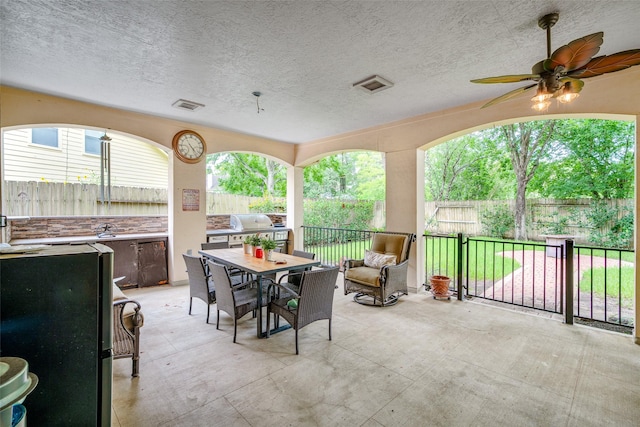 9706 Broadley Dr, Sugar Land, TX 77498 - view of patio featuring outdoor dining space, grilling area, and a ceiling fan