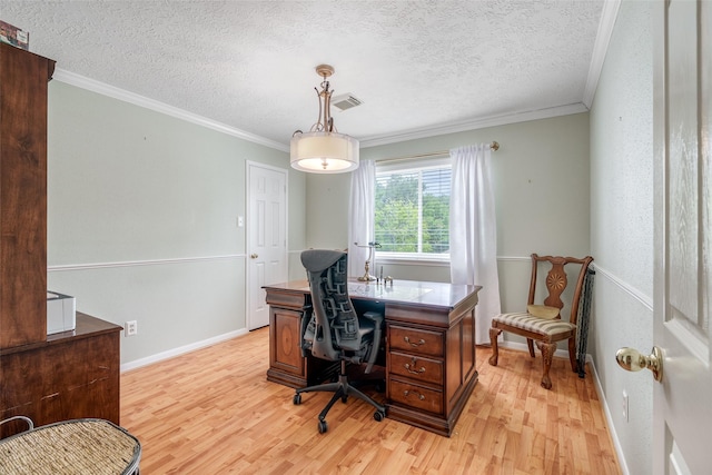 9706 Broadley Dr, Sugar Land, TX 77498 - home office featuring light wood-style floors, ornamental molding, and a textured ceiling
