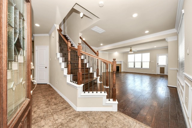 5627 Darling, Houston, TX 77007 - foyer entrance featuring ornamental molding, stairway, a ceiling fan, recessed lighting, and wood finished floors