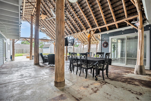 3014 Bayou Dr, La Porte, TX 77571 - fenced backyard featuring a storage shed, outdoor dining space, and a patio area