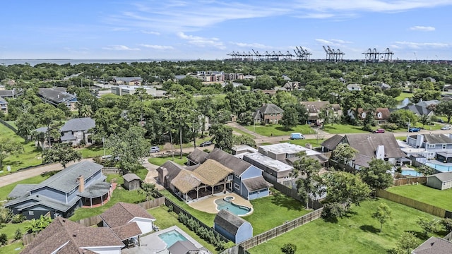 3014 Bayou Dr, La Porte, TX 77571 - aerial perspective of suburban area with a tree filled landscape and a pool area