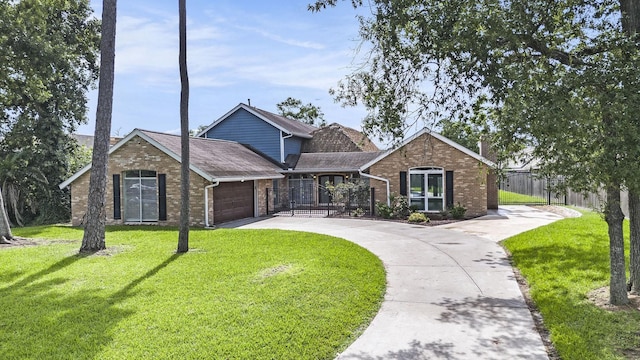 3014 Bayou Dr, La Porte, TX 77571 - view of front of property featuring brick siding, concrete driveway, a garage, and a shingled roof