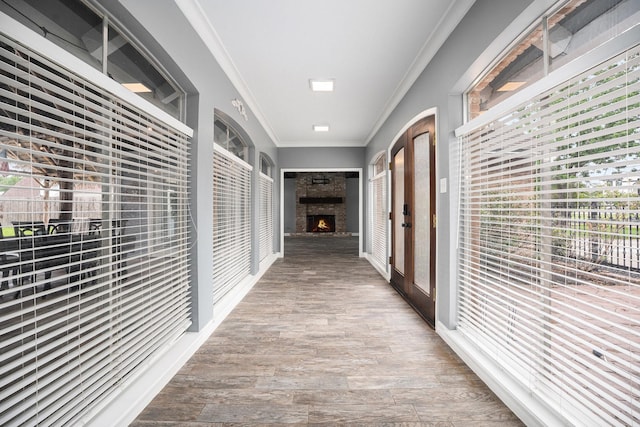 3014 Bayou Dr, La Porte, TX 77571 - hall with wood finished floors, french doors, and crown molding