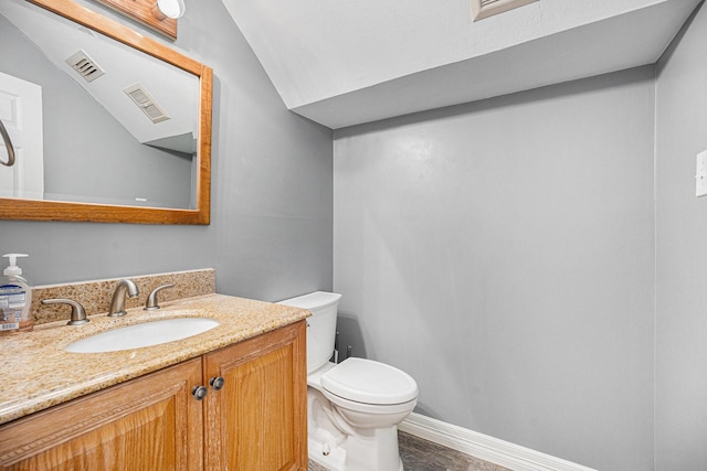 3014 Bayou Dr, La Porte, TX 77571 - bathroom featuring vanity and lofted ceiling