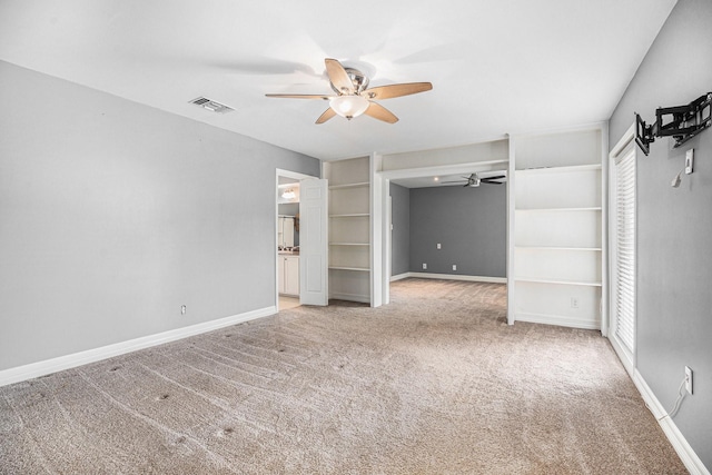 3014 Bayou Dr, La Porte, TX 77571 - unfurnished room with a ceiling fan, carpet flooring, and plenty of natural light