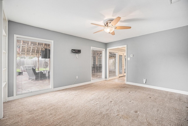 3014 Bayou Dr, La Porte, TX 77571 - carpeted empty room featuring a ceiling fan and baseboards