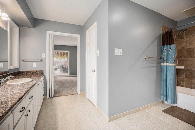 3014 Bayou Dr, La Porte, TX 77571 - bathroom featuring vanity, shower / tub combo, and tile patterned flooring