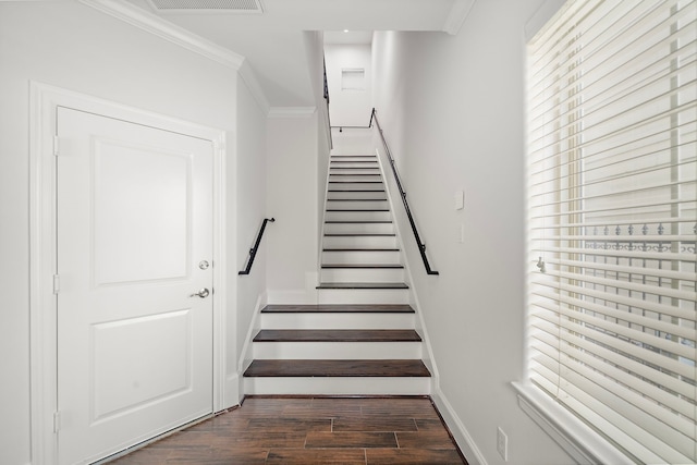 2924 Leeland St, Houston, TX 77003 - staircase featuring crown molding and wood finished floors