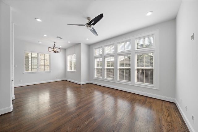 2924 Leeland St, Houston, TX 77003 - spare room with healthy amount of natural light, a chandelier, dark wood-type flooring, recessed lighting, and a ceiling fan