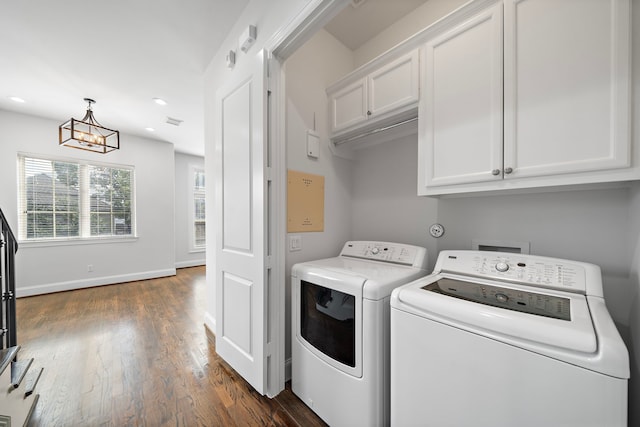 2924 Leeland St, Houston, TX 77003 - washroom featuring washing machine and clothes dryer, a chandelier, cabinet space, dark wood finished floors, and recessed lighting