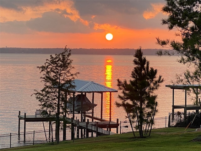 110 Penguin Pt, Point Blank, TX 77364 - water view featuring boat lift and a boat dock