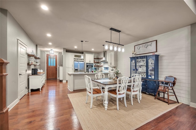 10252 Sunset Ln, Conroe, TX 77385 - dining room featuring wood finished floors and recessed lighting