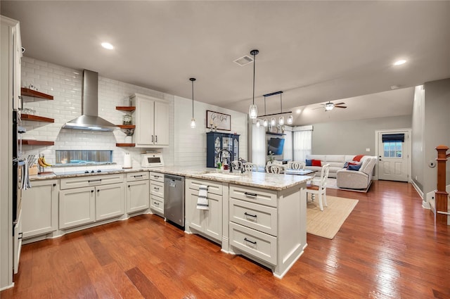 10252 Sunset Ln, Conroe, TX 77385 - kitchen with wall chimney range hood, a peninsula, open shelves, dishwasher, and a ceiling fan