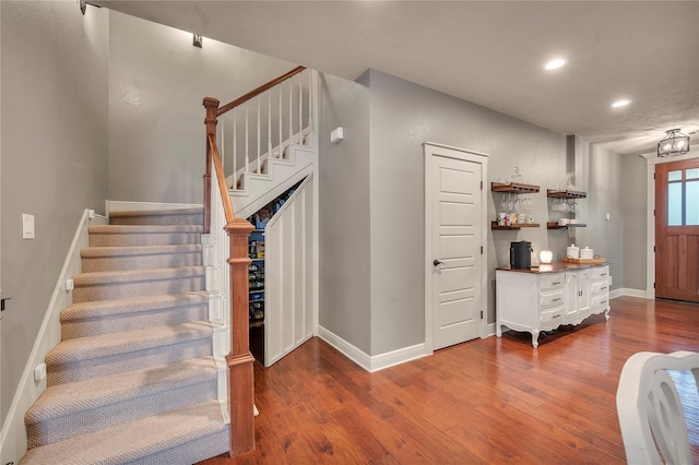 10252 Sunset Ln, Conroe, TX 77385 - entrance foyer featuring dark wood-style floors, stairway, and recessed lighting