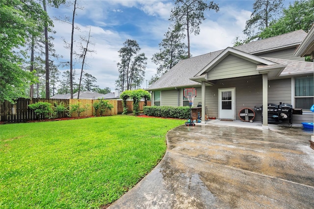 10252 Sunset Ln, Conroe, TX 77385 - fenced yard with a patio area