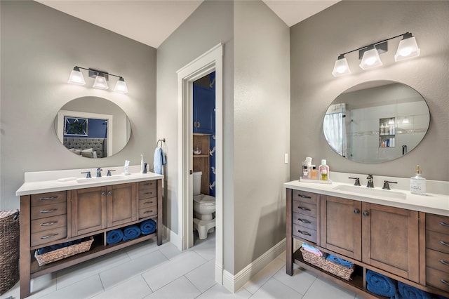 10252 Sunset Ln, Conroe, TX 77385 - full bath featuring two vanities and tile patterned floors