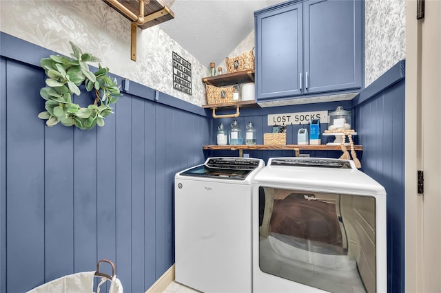 10252 Sunset Ln, Conroe, TX 77385 - laundry area with washer and dryer and cabinet space
