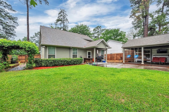 10252 Sunset Ln, Conroe, TX 77385 - view of front facade featuring a patio and roof with shingles