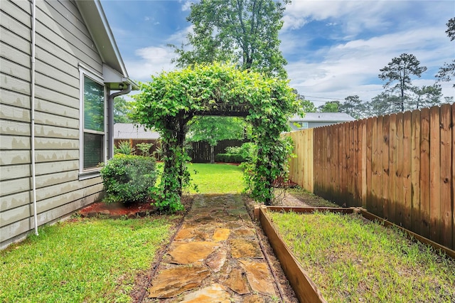 10252 Sunset Ln, Conroe, TX 77385 - fenced backyard with a garden