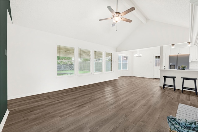 4005 Stoneybrook St, Baytown, TX 77521 - unfurnished living room with beamed ceiling, a chandelier, a ceiling fan, dark wood-style floors, and healthy amount of natural light