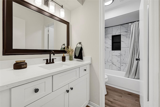 4005 Stoneybrook St, Baytown, TX 77521 - full bathroom with vanity, wood finished floors, and shower / bathtub combination with curtain
