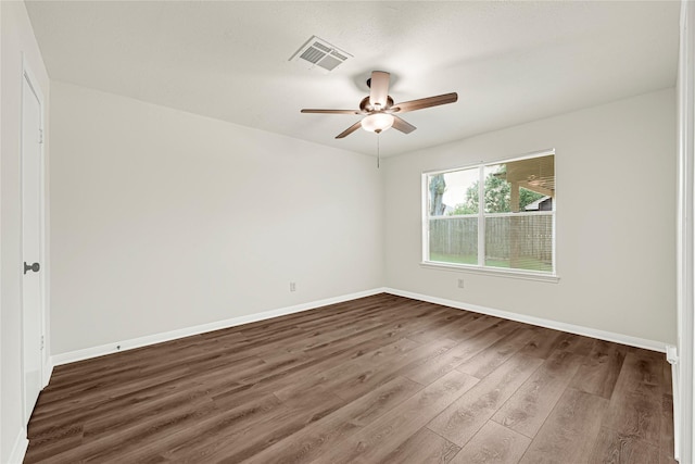 4005 Stoneybrook St, Baytown, TX 77521 - unfurnished room with dark wood finished floors and ceiling fan